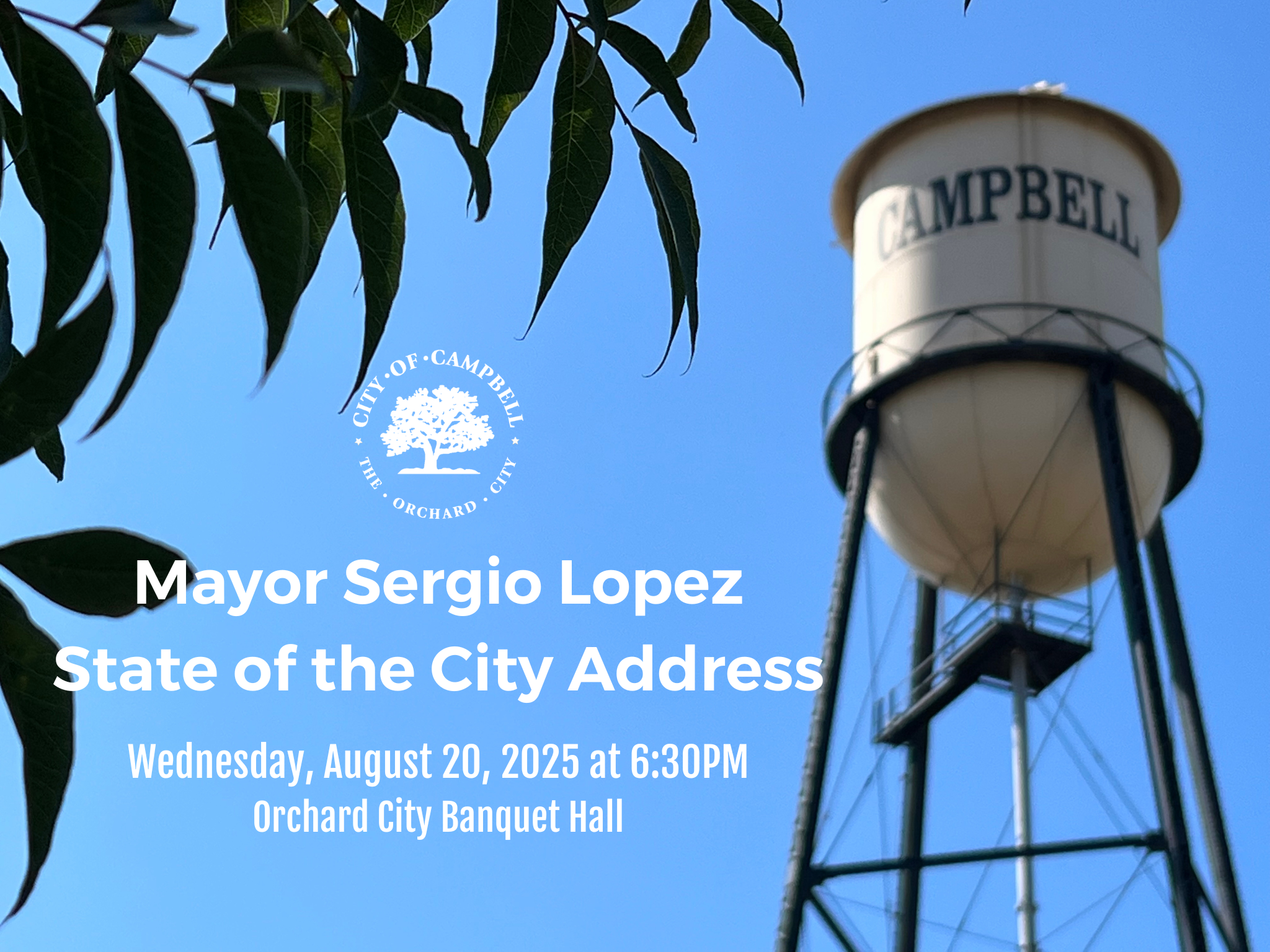 clear sky, white text, water tower